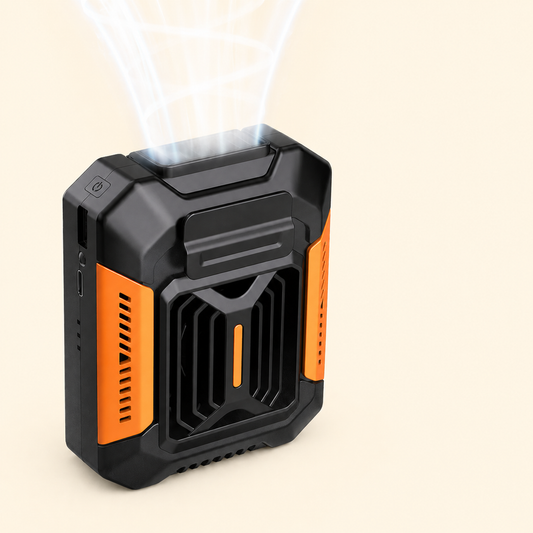 Black and orange portable cooling fan on a beige background