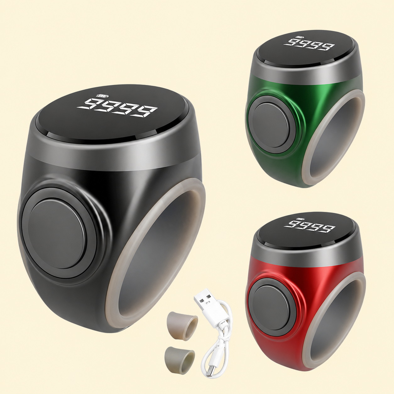 Three electronic tasbih zikr rings in black, green, and red with digital displays on a beige background.