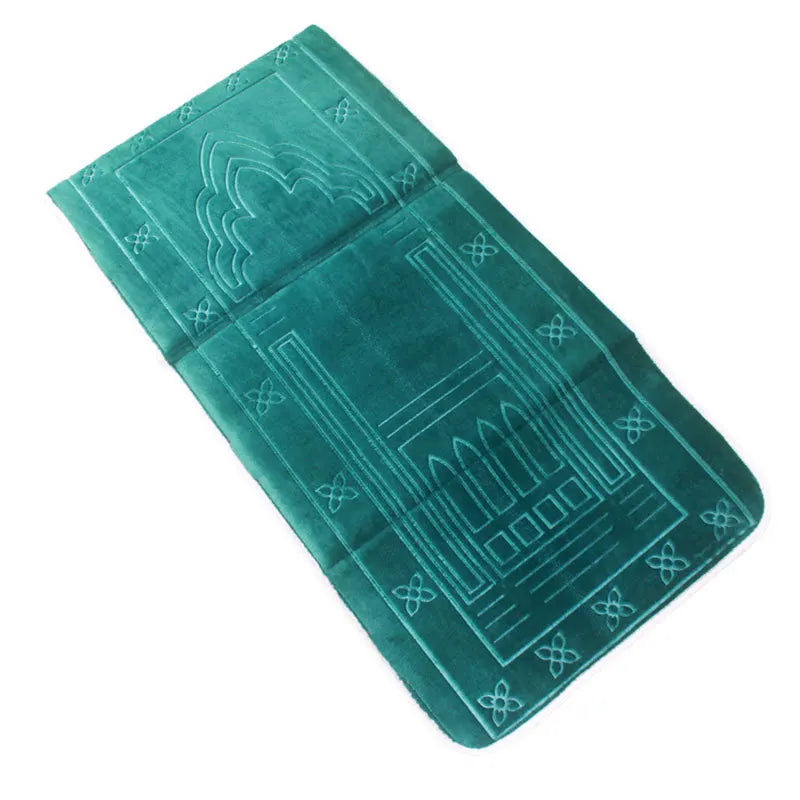 Teal Islamic prayer mat with intricate patterns on a white background, featuring the Midda brand.