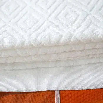 Stack of different design Folded Premium High Quality Ihram for men for hajj and Umrah pilgrimage . 