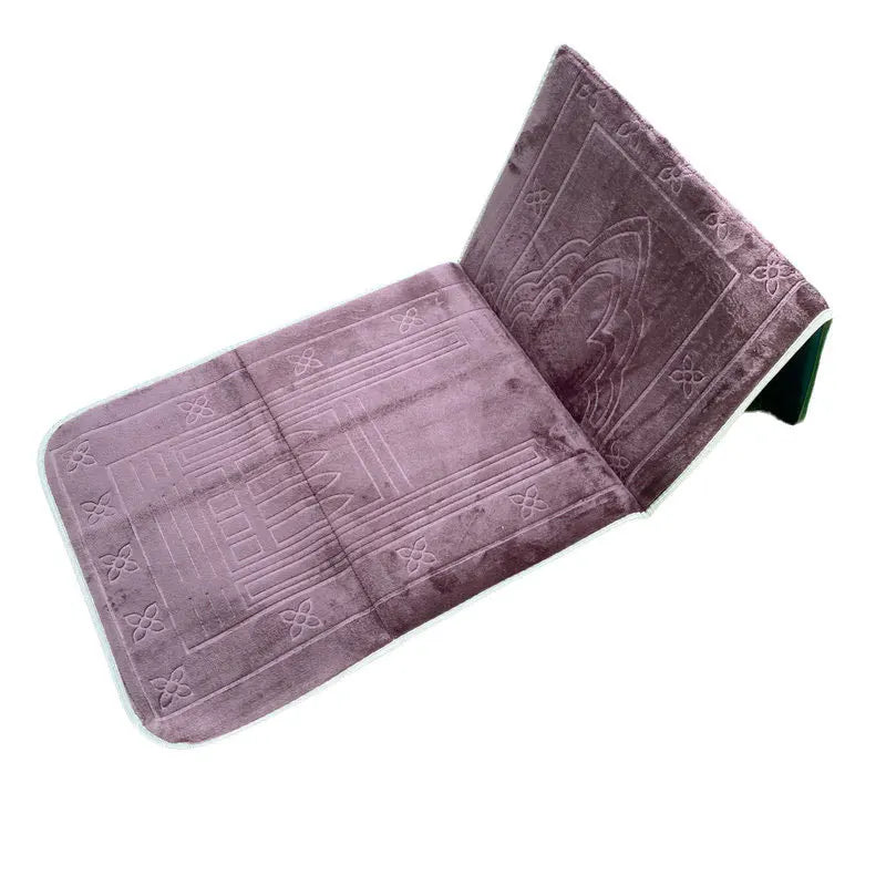 Purple soft memory foam Islamic Prayer mat with back rest and  embossed patterns on a white background