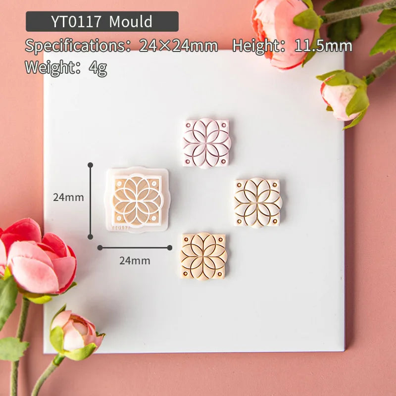 Wooden moulds with floral patterns on a white background with flowers around