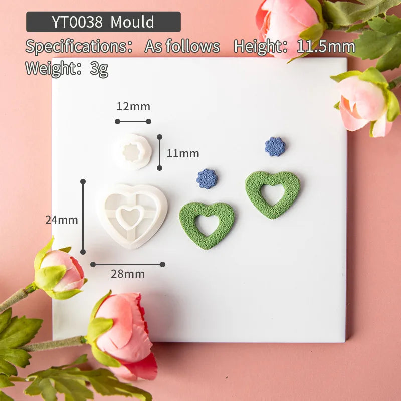Heart-shaped cookie mould with measurements on a pink background