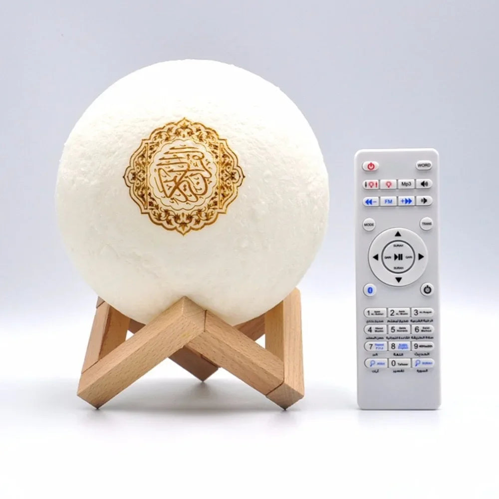 Moon lamp with wooden stand and remote control on a light gray background