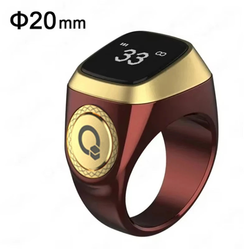 Smart maroon zikr ring with digital display and gold accents on a white background