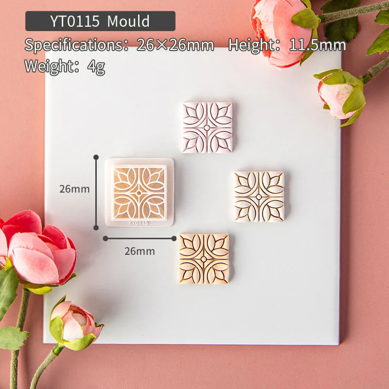 Decorative mould with floral patterns on a white background with flowers around