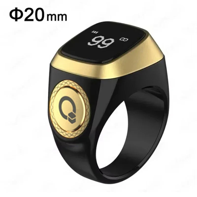 Smart zikr ring with digital display and gold accents on a white background