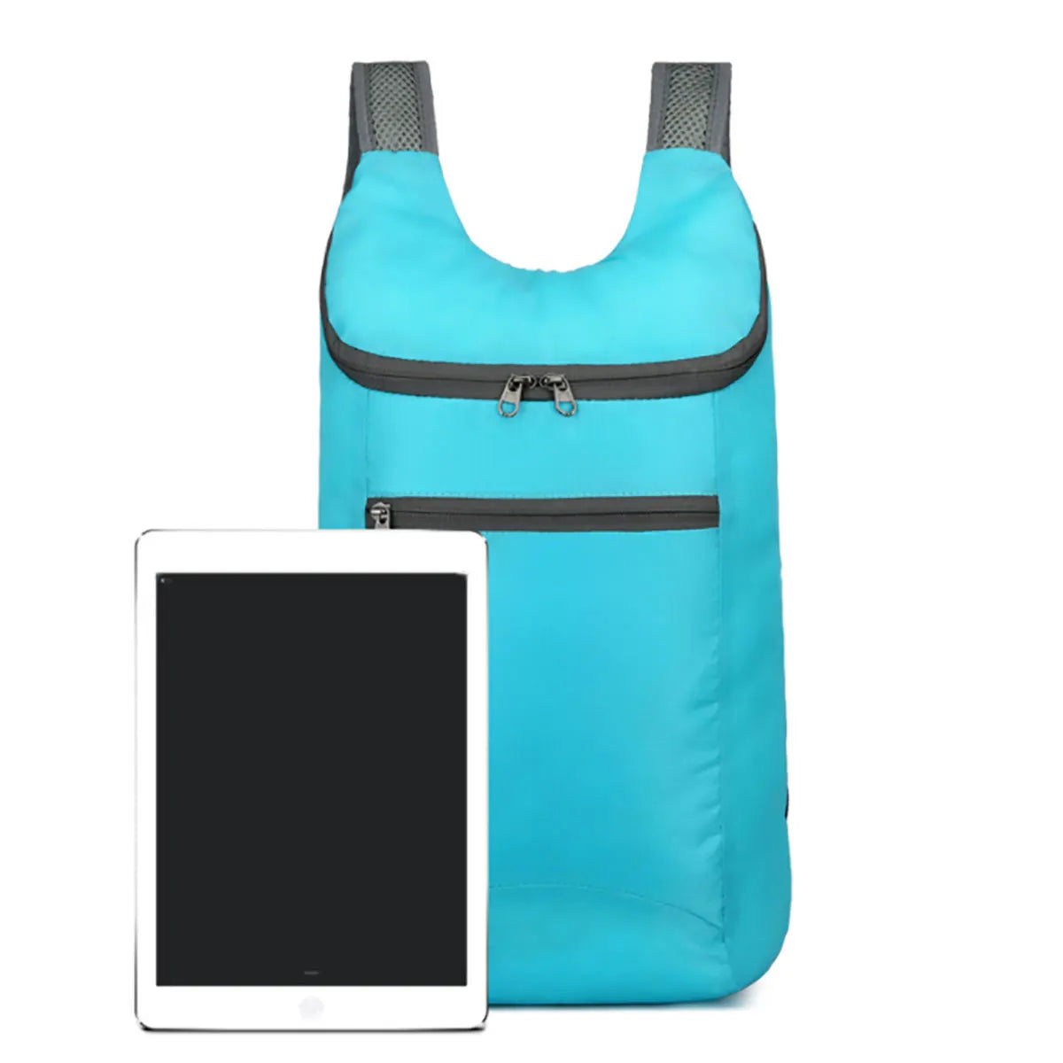 Blue folding backpack with black accents and a tablet for scale on a white background for hajj and umrah pilgrimage