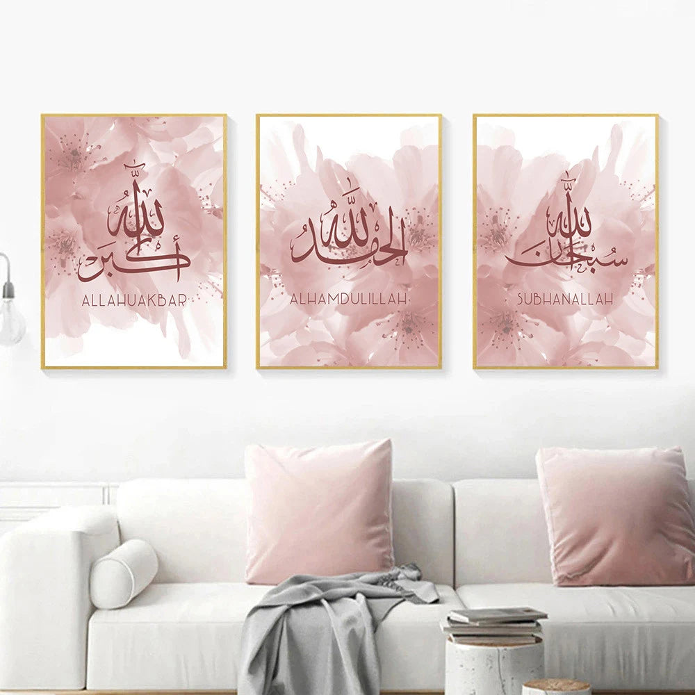 Three framed canvas wall artworks with Islamic Arabic calligraphy on a wall above a white sofa.