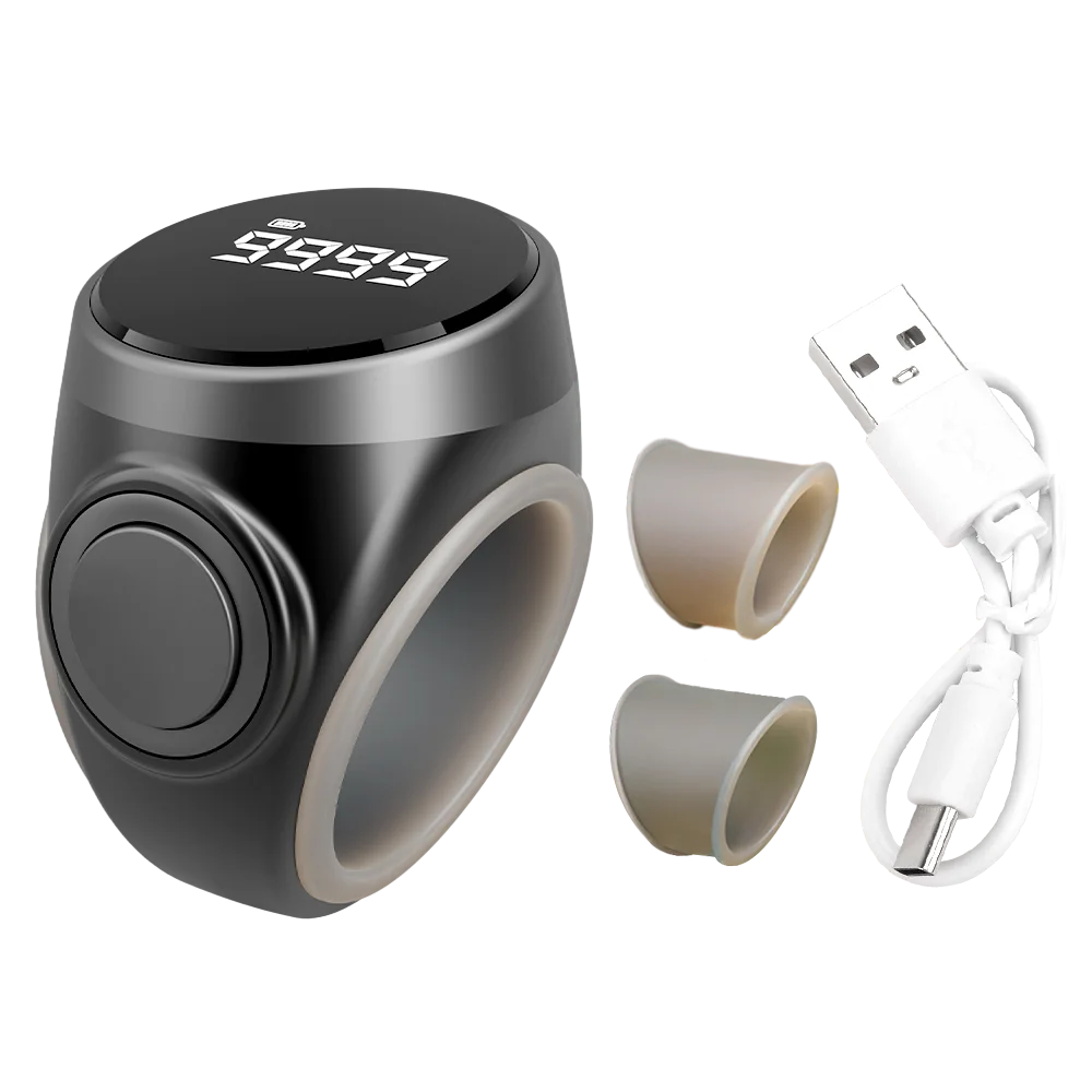Black electronic tasbih zikr ring device with digital display, earbud covers, and USB cable on a white background
