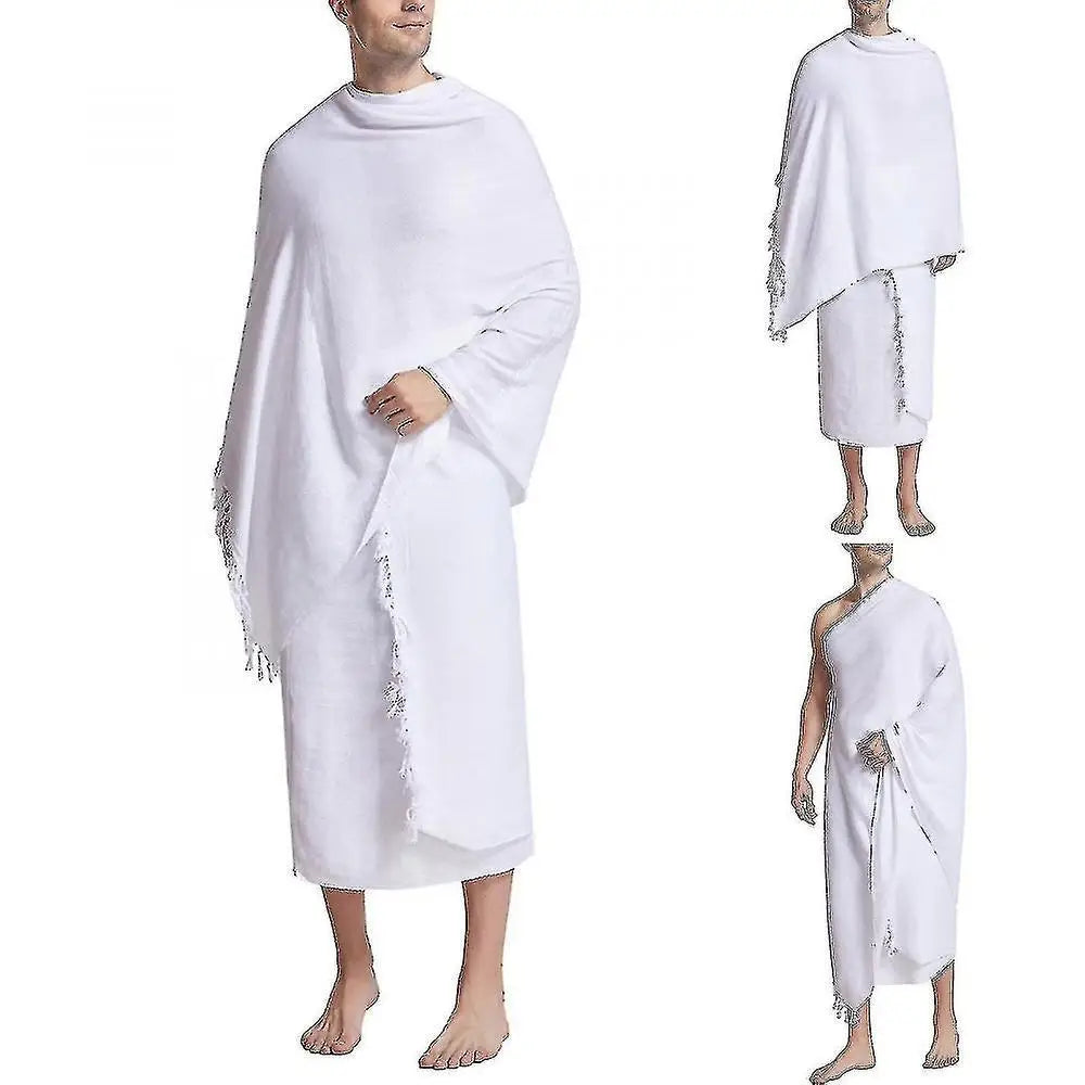 White ihram for hajj and umrah pilgrims with fringe details draped over a person on a white background