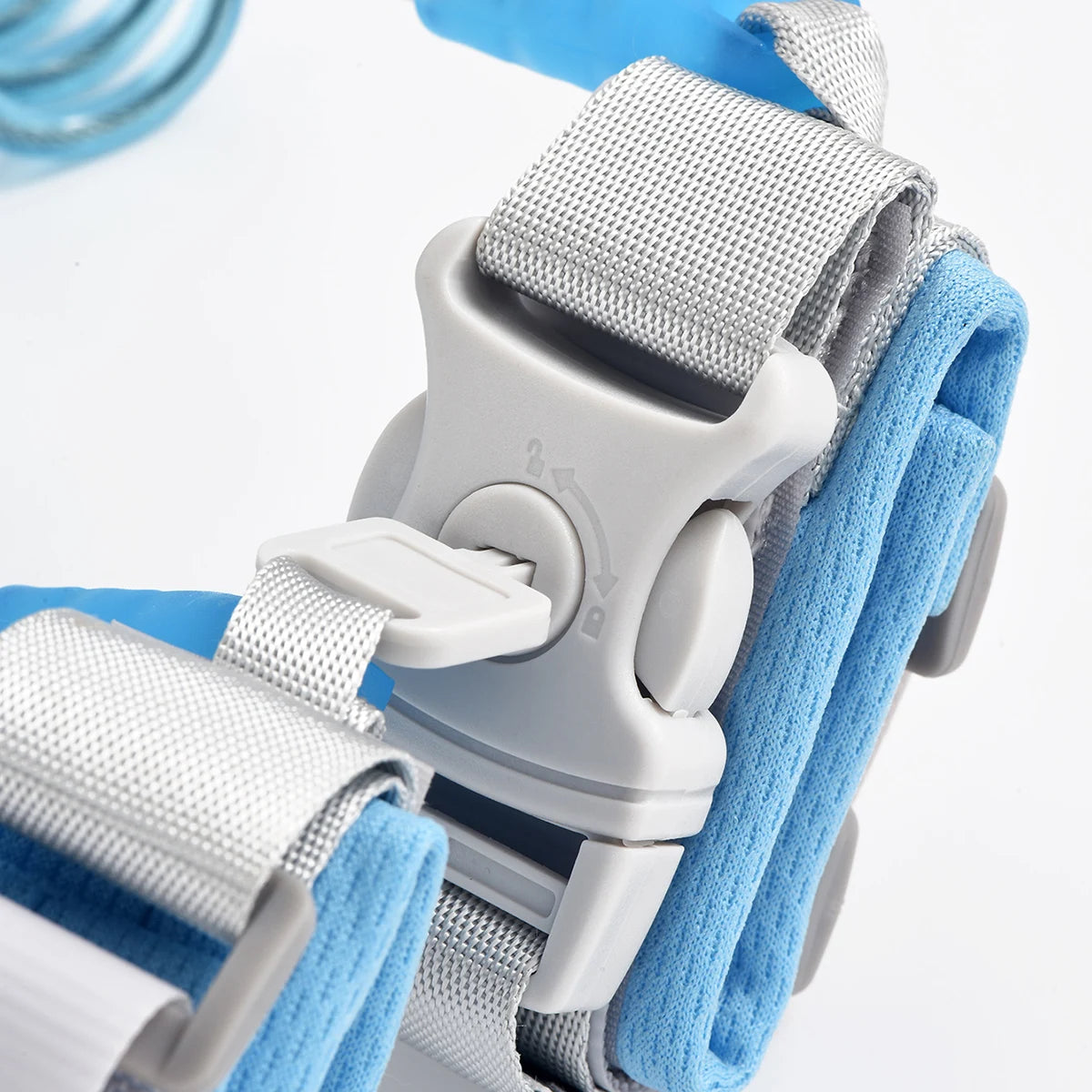 Close-up of a blue and gray strap with a buckle on a white background