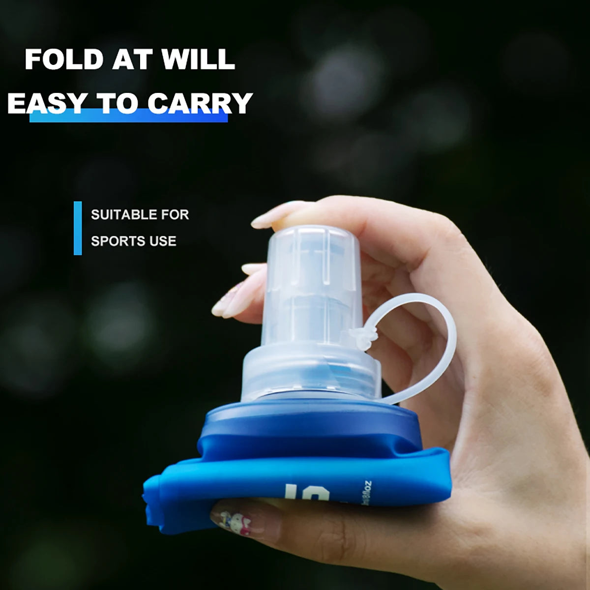 Hand holding a collapsible bottle so that it can be carried for hajj and umrah pilgrimage.
