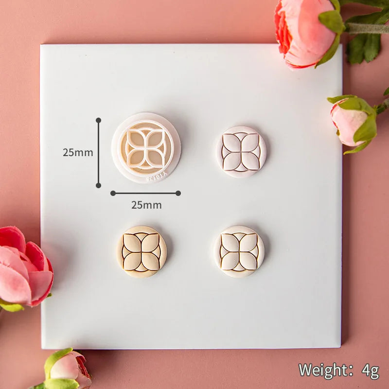 Set of four floral-shaped cookie cutters on a white square with measurements and weight displayed, surrounded by pink flowers.
