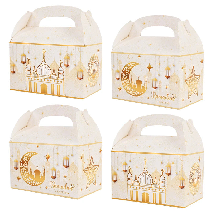 Four white gift boxes with gold Ramadan designs on a white background