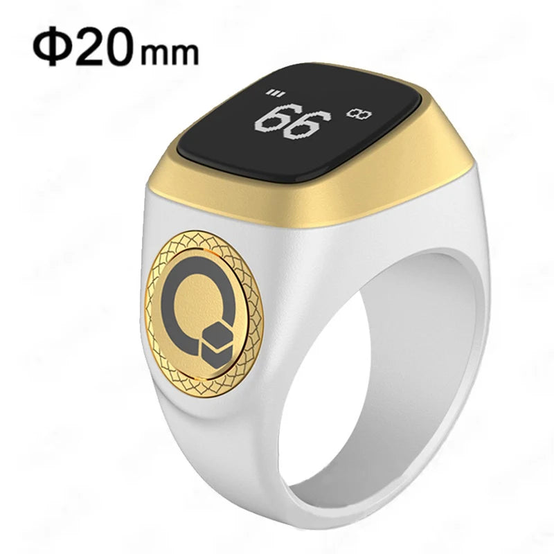 Smart zikr ring with digital display and gold accents on a white background