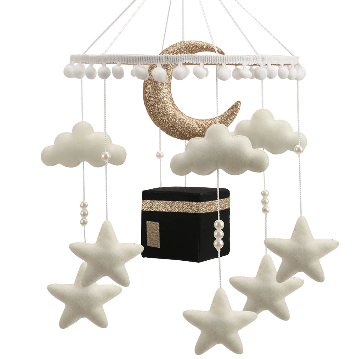 Decorative hanging mobile with clouds, stars, and a black cube on a white background.